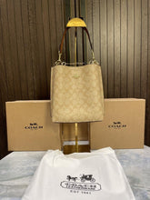 Coac  h mollie signature bucket bag with extra long sling and carry bag & OG box 478