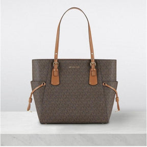 Michael  kors voyager tote bag with dust bag (616 coffe brown)