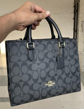 Coac  h Maggie Small Tote Bag In Blocked Signature Canvas with extra long sling & with box 455