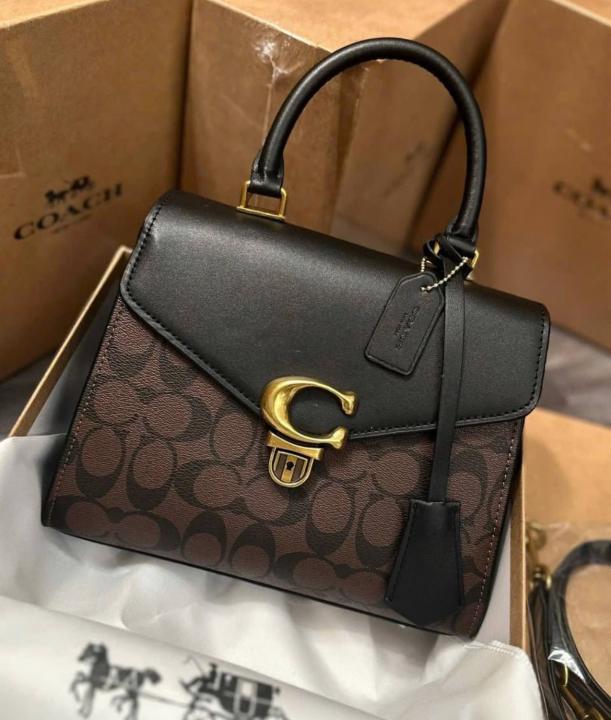 coac  h sammy 21 signature tophandle bag  Comes with Extra long sling And carry bag & box 475