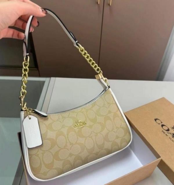 COAC  H Teri Shoulder Bag In Signature Canvas dual belts with og box 188